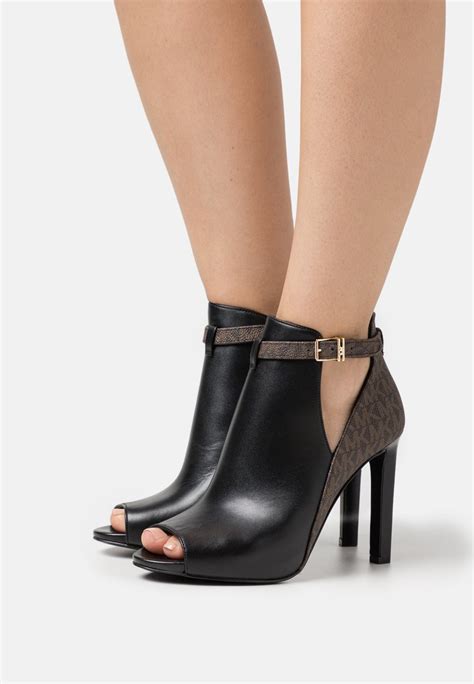 michael kors booties sale|michael kors heeled boots.